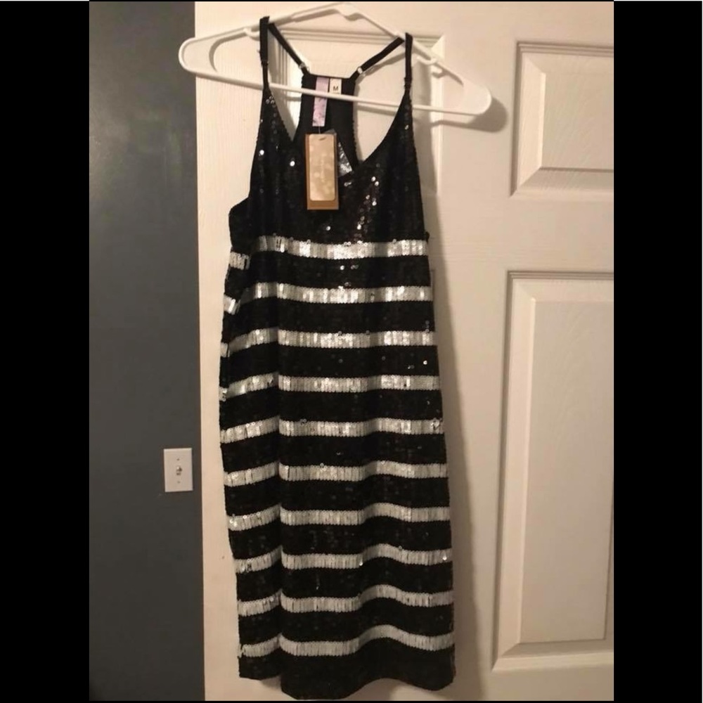 Black and silver sequin dress